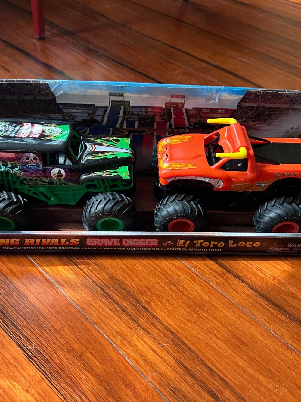 NIB Monster Jam Official Grave Digger vs El Toro Loco Remote Control Trucks